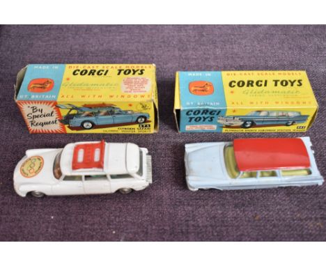 Two Corgi Toys diecasts, 445 Plymouth Sports Suburban Station Wagon in light blue with red roof and cream interior in origina