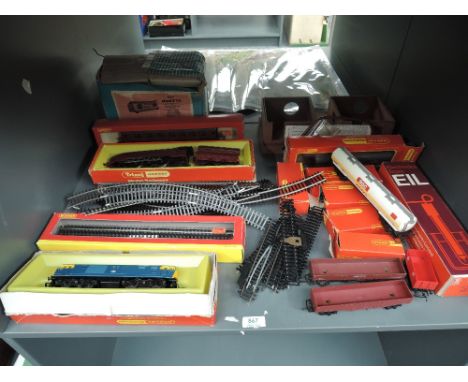 A shelf of Hornby and similar 00 gauge including Triang R871 LMS 4-6-2 King George VI Loco &amp; Tender 6244, part boxed, R75