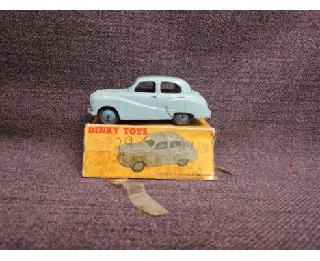 A Dinky diecast, 161 Austin Somerset, Light Blue and Dark Blue Hubs in original box, missing both end flaps
CONDITION REPORT
