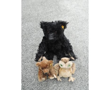 Two modern Steiff Bears, 003509 Black Bear, 029578 Baby Bear olong with a similar Owl