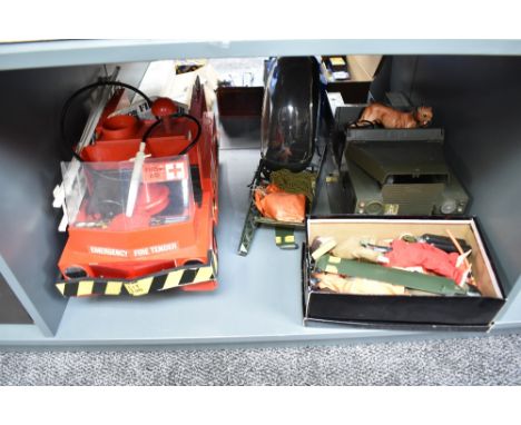 A shelf of Action Man including Transport Command Emergency Fire Tender in original box with instructions, Helicopter, Landro