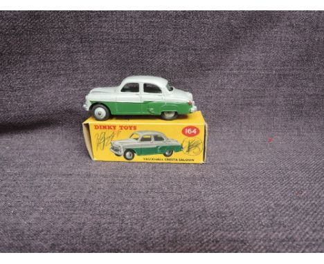 A Dinky diecast, 164 Vauxhall Cresta Saloon, Grey &amp; Green, in original correct spot box