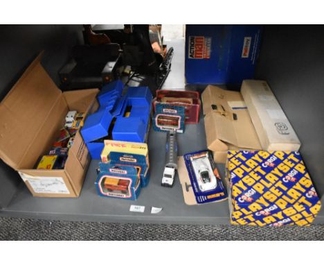 A shelf of 1980's Matchbox diecasts, similar period Corgi and Lledo included, some boed