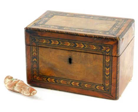 A walnut and parquetry tea caddy, the hinged lid enclosing two lidded divisions, 18cm wide, and an Egyptian terracotta tomb t