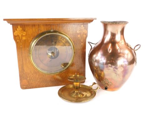 A group of copper and brassware, to include a copper vase previously part of a tea urn, with twist design handles and a brass