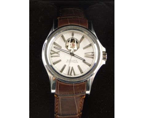 A Bulova Accutron gentleman's wristwatch, having a sun dial style figured white dial, with applied Roman numerals and stick m