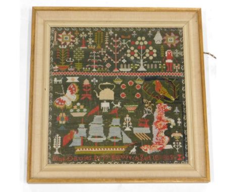 A mid 19thC woolwork sampler, decorated with trees, cattle, butterfly, seated dog, three masted sailing ship, signed Jane Dav
