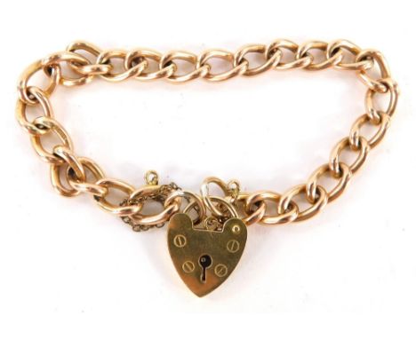 A 9ct gold gate bracelet, with belcher chain and heart shaped padlock, with safety chain, 18cm long, 19.7g.