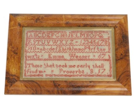 A mid 19thC alphabetic sampler, with red stitching by Emma Weaver dated 1867, 18cm x 29cm .