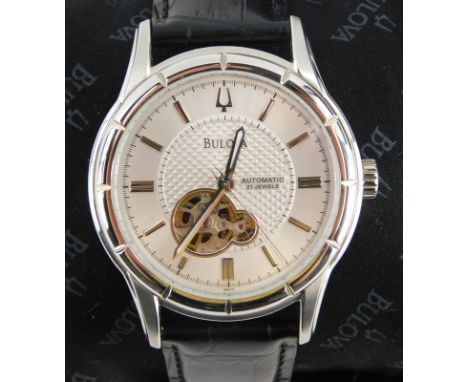 A Bulova Automatic stainless steel gentleman's wristwatch, having guilloche effect central dial with raised chaptering having