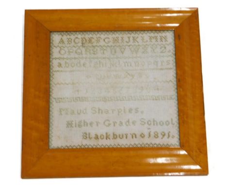 A late 19thC alphabetic sampler, by Maud Sharples, High Grade School, Blackburn, dated 1891, (AF), 28cm x 29cm. 