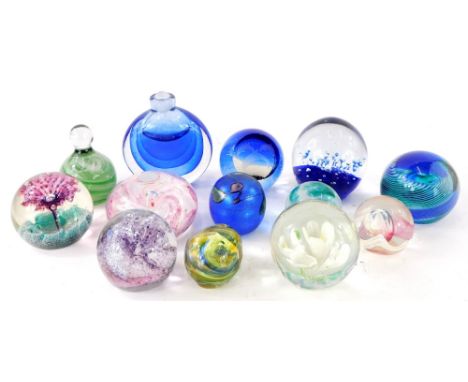 A group of Art Glass paperweights, a Caithness Scotland Eye of The Storm, a Caithness fountain, and various others, unmarked.