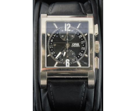 A gentleman's Oris stainless steel wristwatch, having rectangular dial with circular central section, having rotating date in