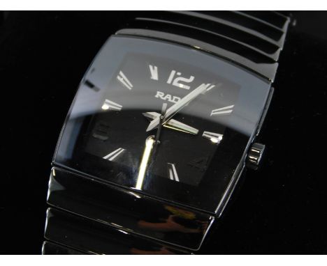 A Rado gentleman's wristwatch in ceramic, having rectangular dial with applied coffin markers and Arabic numerals with date a