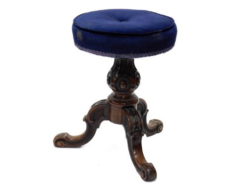 A 19thC rosewood piano stool, with a padded top, a baluster turned and carved column and tripod base.