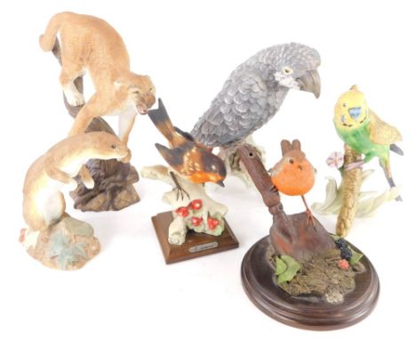 Miscellaneous ceramics, to include a Goebel grey parrot, a similar budgerigar, a Franklin Mint figure The Defender, etc. 