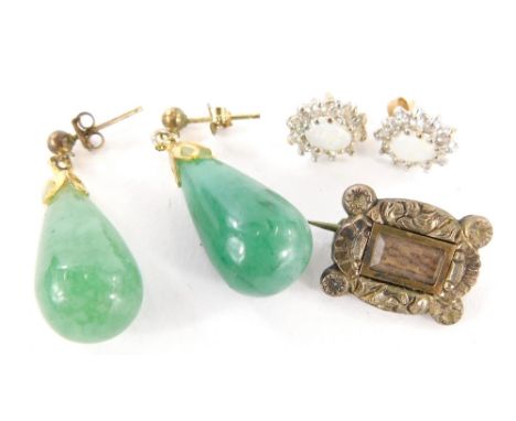 A small group of jewellery, to include a pair of jade drop earrings, a pair of opal and white stone set silver dress earrings