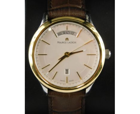 A gentleman's Maurice Lacrox bi-metallic wristwatch, having cream dial with day aperture to twelve o'clock and date aperture 