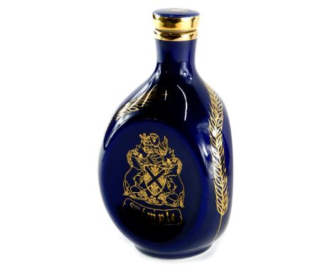 A bottle of Haig commemorative Whisky, in ceramic decanter, 75cl.
