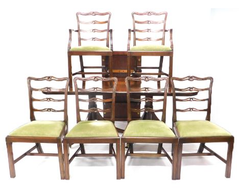 A set of six mahogany ladder back dining chairs in George III style, each with a green padded seat on channelled legs with H 