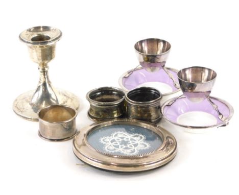 A collection of small silver and silver plated items, to include a George VI squat candlestick, with loaded base, 9cm high, B