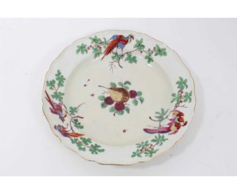 A Worcester plate, circa 1770, with scalloped rim, painted in the London atelier of James Giles with birds and fruits, 22.5cm