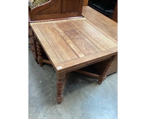 1930s light oak draw-leaf dining table and six chairs with spiral twist front legs 