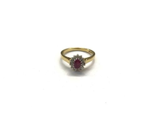 18ct gold ruby and diamond cluster ring, size P½Ring weighs 4 grams.Good overall condition. Claws all in tact and the shank i