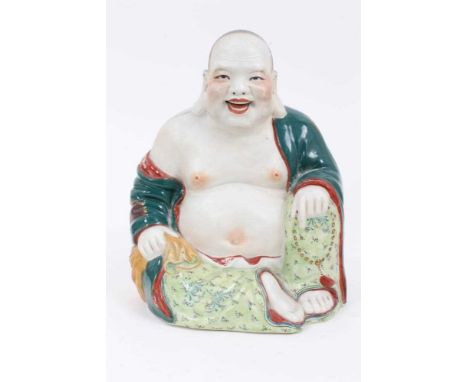 A 20th century Chinese porcelain figure of Buddha, seated with polychrome decoration, impressed seal marks to base, 21cm high