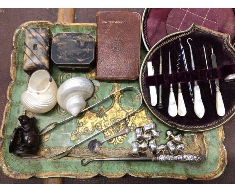 Pair silver sugar tongs, silver handled button hook, pair of shell salts, manicure set, wooden netsuke in the form of a rat, 