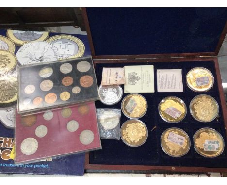 Group of commemorative coins including seven gold plated British Banknotes coins and some coin first day coversChange Checker