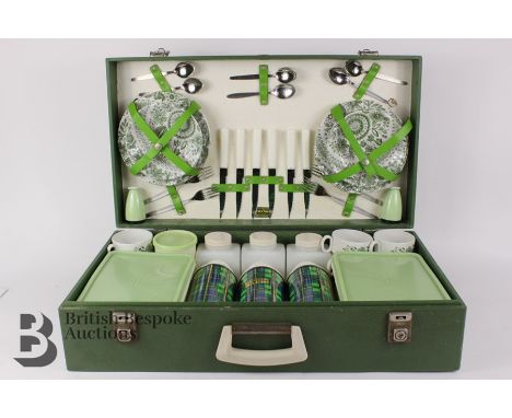 Vintage 1950's Brexton picnic set, comprising three thermos, six cups and saucers, six sandwich plates, two Tupperware boxes,