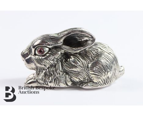 Silver rabbit having ruby eyes, approx 5 x 3 cms.&nbsp;