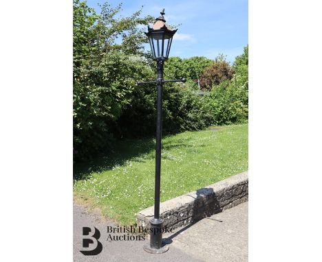 Victorian black enamel painted cast metal lamp post, the lamp post features ladder bars, approx 9 feet in height, ideal for a