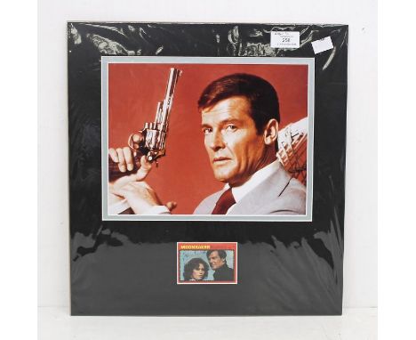 JAMES BOND 007 Roger Moore - A Trading Card Signed / Autographed personally by Roger Moore in a mounted display. It measures 