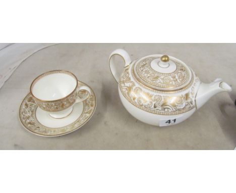 A Wedgwood gold Florentine teapot and cup and saucer