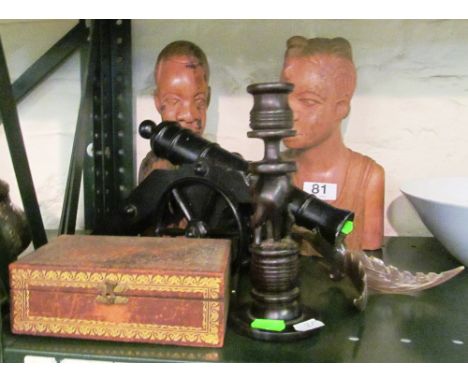 Two treen busts, canon, box, horn bird and treen candlestick