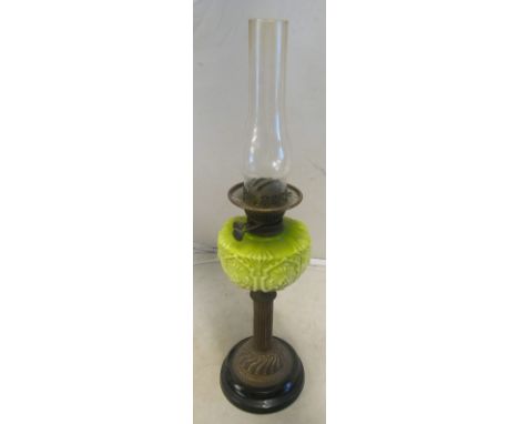 A Victorian oil lamp with glass reservoir