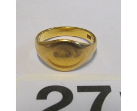 An 18ct gold signet ring 4.4g size J/K