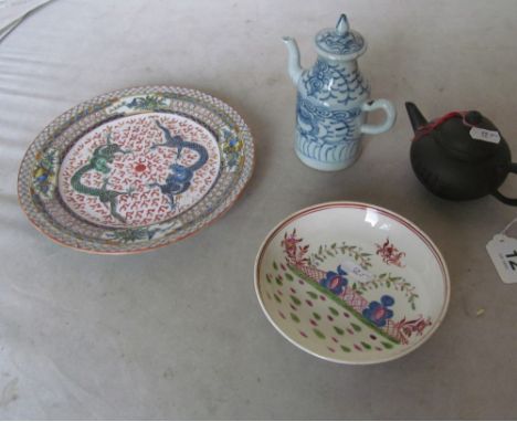 A plate with dragon design, small hot water jug, dish, pottery teapot and two bowls decorated birds