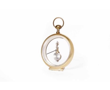 JAEGER LE COULTRE BRASS AND GLASS CASED DESK CLOCKmodelled in the form of a pocket watch, with sixteen jewel skeleton movemen