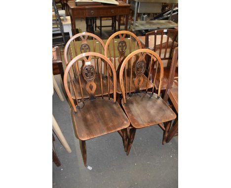 SET OF FOUR ERCOL STICK BACK CHAIRS