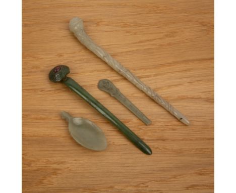 Two jade hairpinsChinese, 18th/19th Centuryincluding a pale green hairpin carved with a chi-long dragon, 17cm long, a spinach