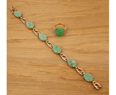 Two pieces of jade jewellery English, 20th Centurythe first a 9ct gold panel bracelet, set with six carved jade panels, 18cm 