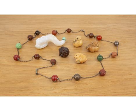 Group of piecesChinese and Japaneseincluding a necklace with hardstone, lacquer, carved nut, white metal and other beads, 128
