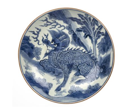 Blue and white porcelain chargerChinese, Shunzi period, circa 1650-1660painted with qilin and banana plants, and marked with 