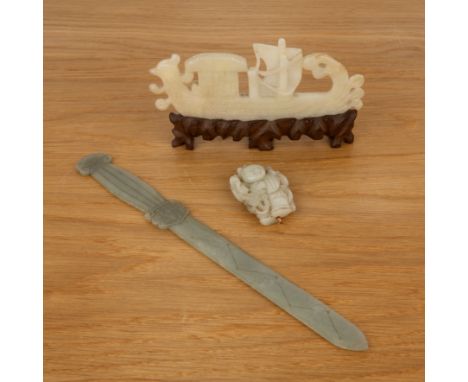 Group of three jade piecesChinese, 19th/20th Centuryincluding a model sceptre with a carved ruyi handle with Shou character, 