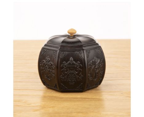 Octagonal hardwood box and coverChinese, 20th Centuryeach side with carved auspicious symbols, 8cm wide x 6cm high  With ligh