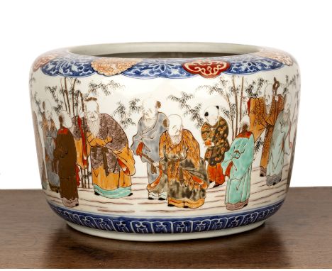 Arita porcelain jardiniereJapanese, mid 19th Centurypainted in an Imari palette with a band of Immortals, 29.5cm diameter x 1