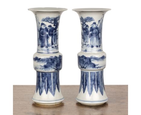 Pair of blue and white porcelain Gu vasesChinese, 19th Centurypainted with scholars, river landscapes and palmettes, four cha